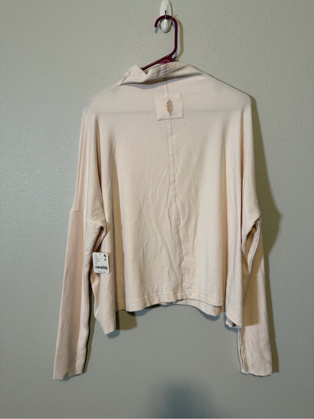 Free People movement cream mock neck, long sleeve shirt XS $108